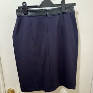 Never worn navy skirt with blue leather waistband